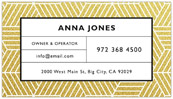 A business card with gold patterned design.
