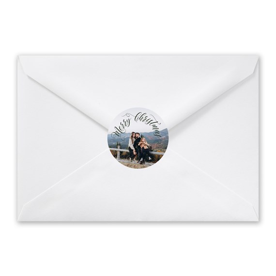 white envelope with circular photo placeholder and calligraphy text