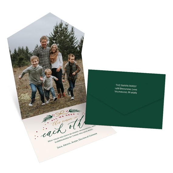holiday card design with photo area and green envelope