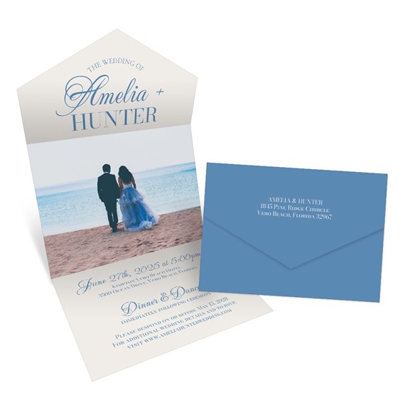 wedding invitation with beach scene and blue envelope