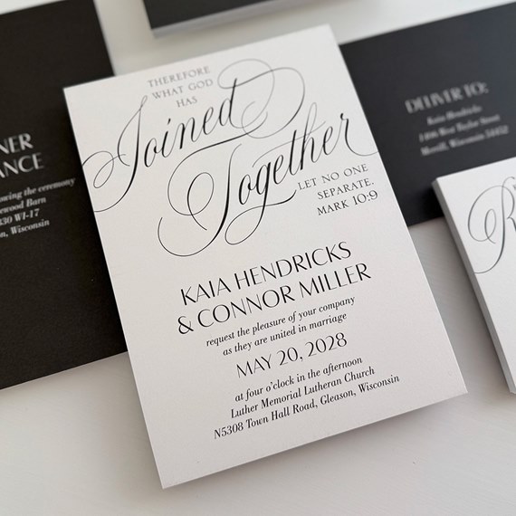 wedding invitation with ornate typography and customizable text area