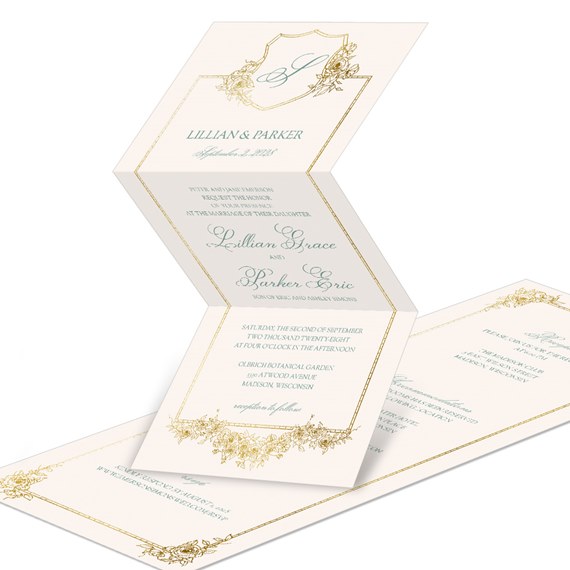 floral monogram invitation with gold border and text