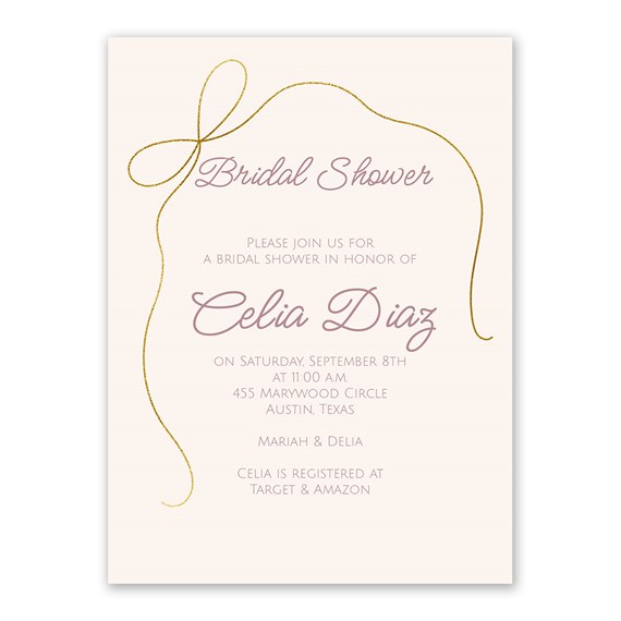 bridal shower invitation with gold bow and cream background