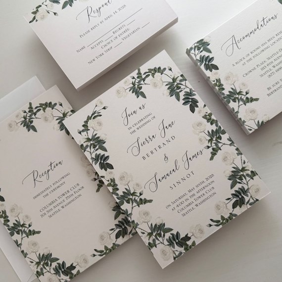 floral wedding invitation set with cream background and white roses