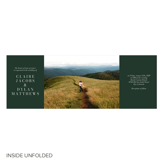 landscape wedding invitation with dark green panels and couple photo area