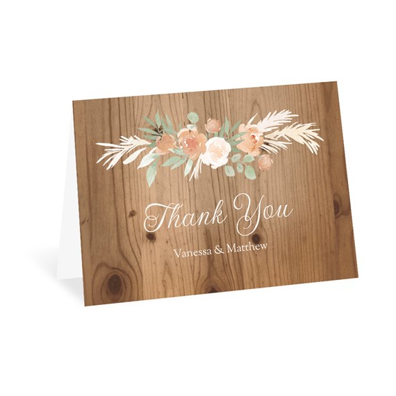 thank you card with floral design and wooden background