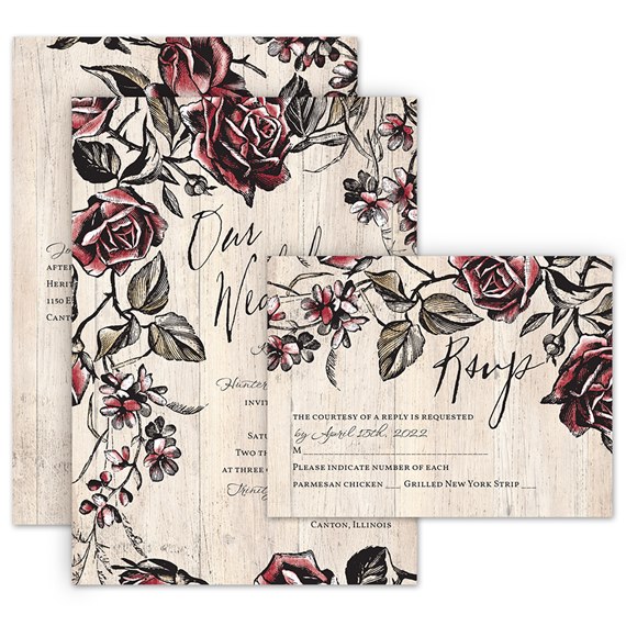floral wedding invitation set with RSVP card and wood background