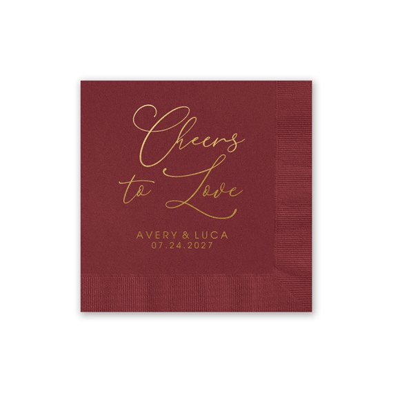 burgundy napkin with gold text and border