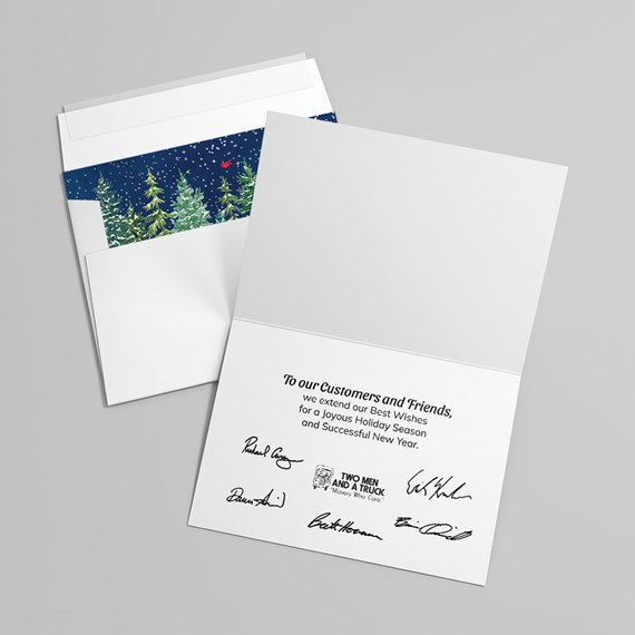 holiday greeting card with snowy forest design and customizable text area