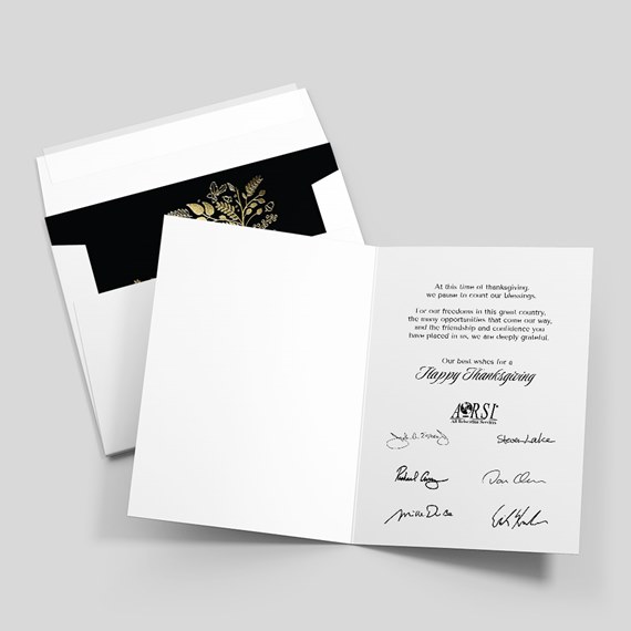 black greeting card with gold floral design and Thanksgiving message