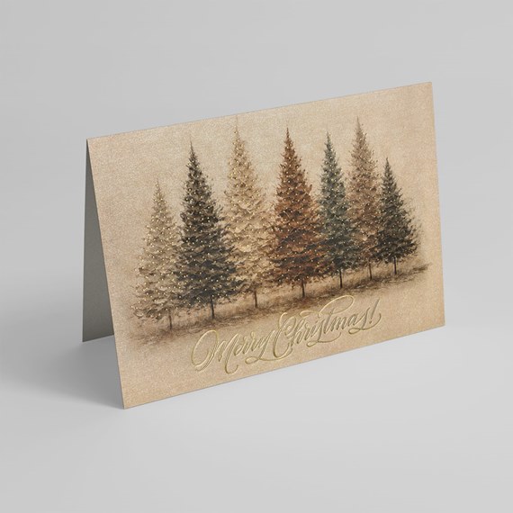 Christmas card with evergreen trees and cursive text