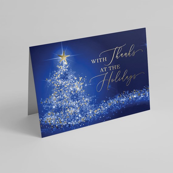 holiday card with Christmas tree and gold foil text