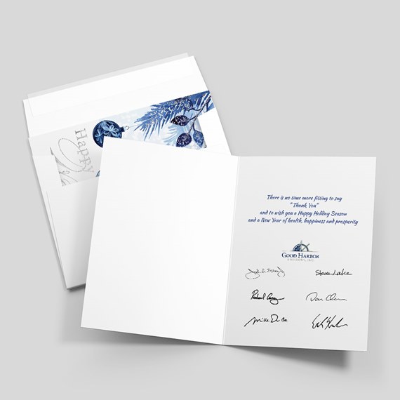 holiday greeting card with blue ornament design and printed message