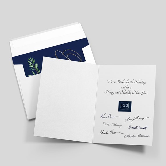 folded card with holiday wishes, blue envelope, leaf design