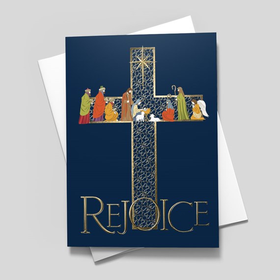 decorative cross card with nativity figures and gold text