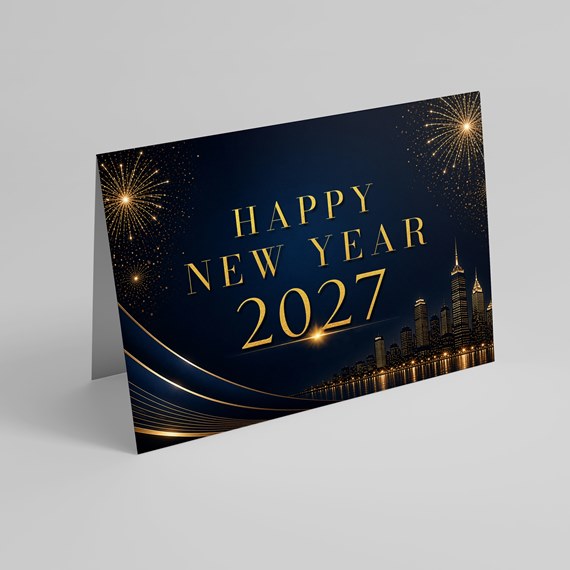 New Year greeting card with fireworks and city skyline