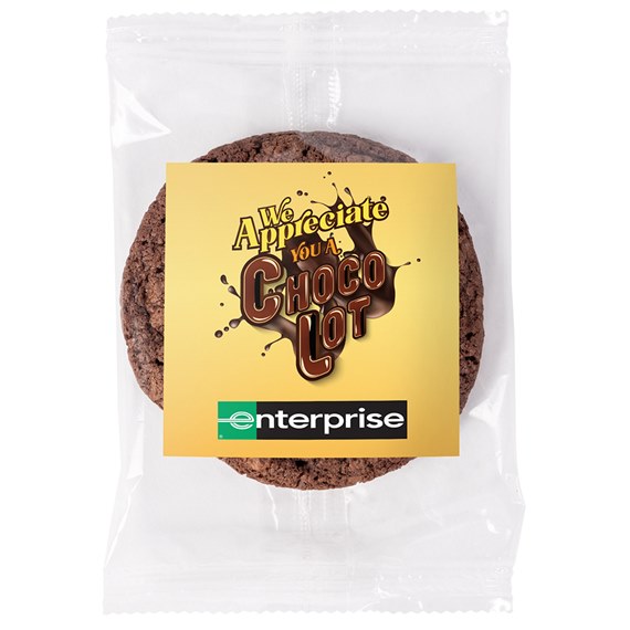 Individually wrapped chocolate cookie with gold label in clear plastic bag
