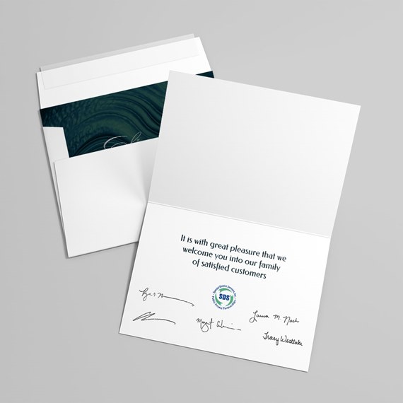 folded card with dark green marbled background and customizable text area