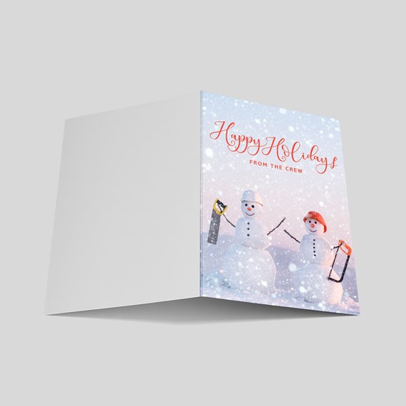 Sawing Snowmen Holiday Card
