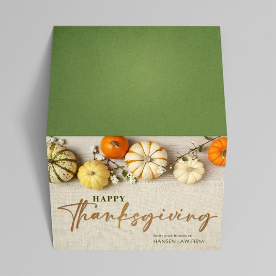 card with green top and pumpkin design