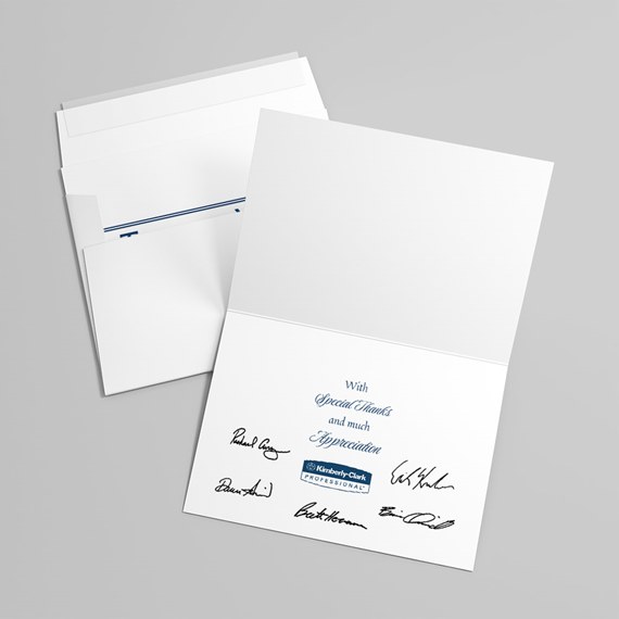 folded card with printed message and signatures