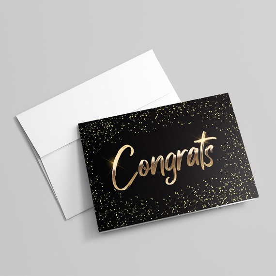 black card with gold text and confetti design