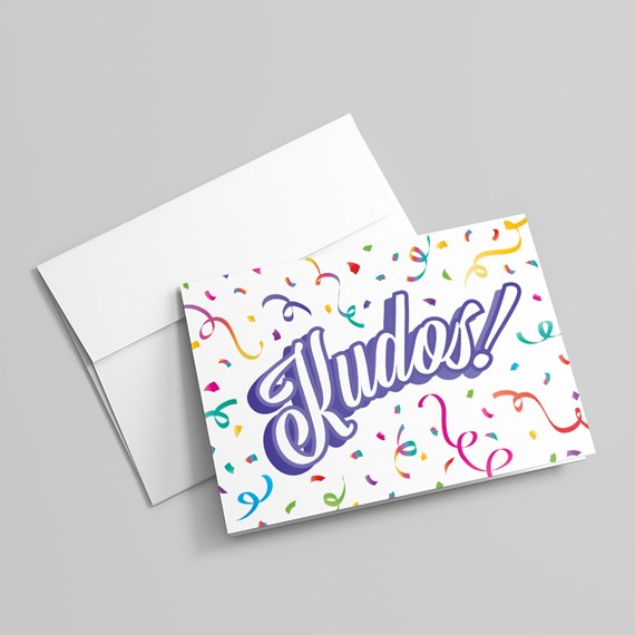 greeting card with colorful confetti and the word Kudos!
