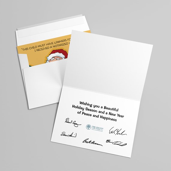 holiday card with cartoon Santa and printed greeting