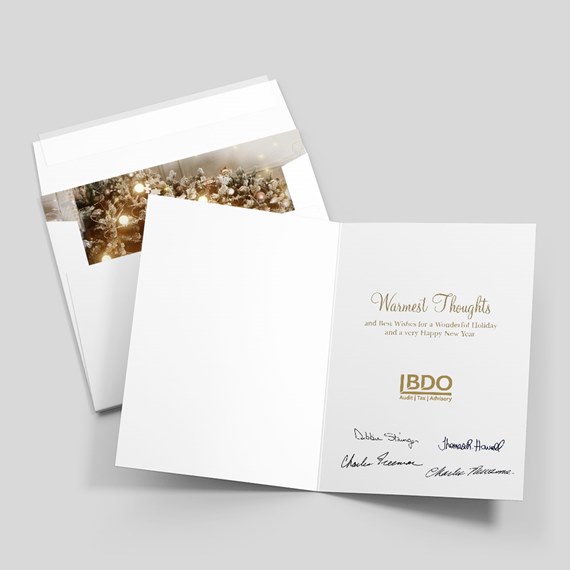 holiday card with photo placeholder and gold text