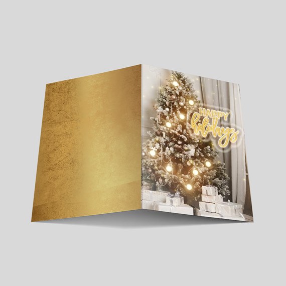 holiday card design with gold background and Christmas tree