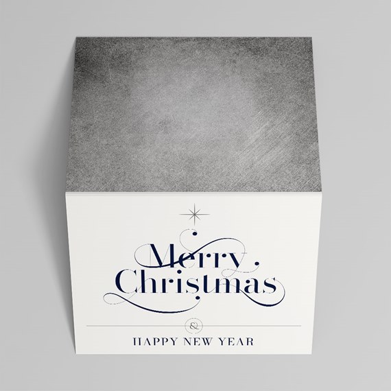 square holiday gift box with gray textured lid and white front reading "Merry Christmas" and "Happy New Year" in navy lettering