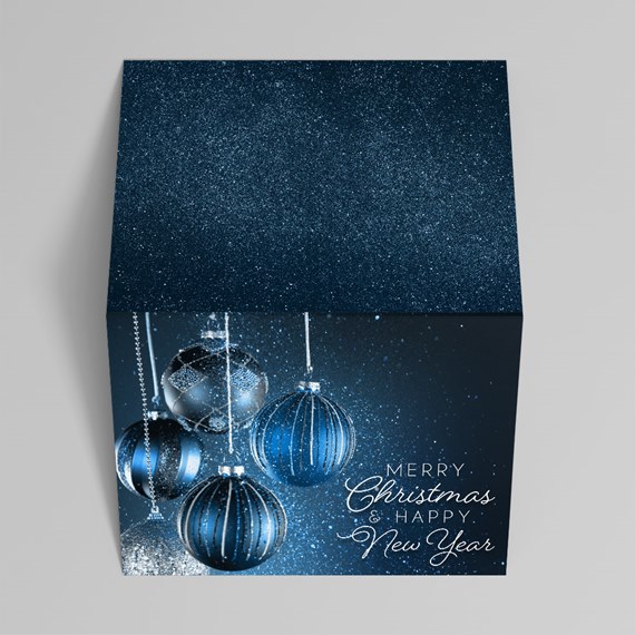 navy blue glitter holiday gift box with hanging ornament design and greeting text