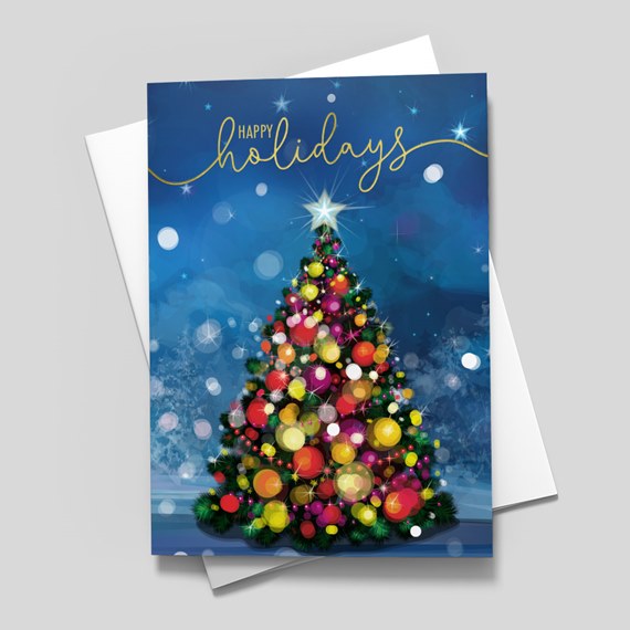 Holiday greeting card with decorated Christmas tree, colorful ornaments, star topper and gold "Happy Holidays" text on blue background