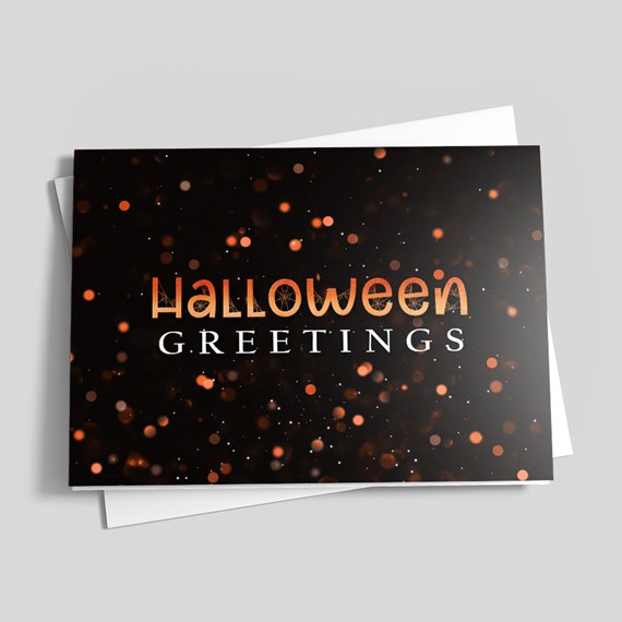 black card with bokeh effect and Halloween greetings text