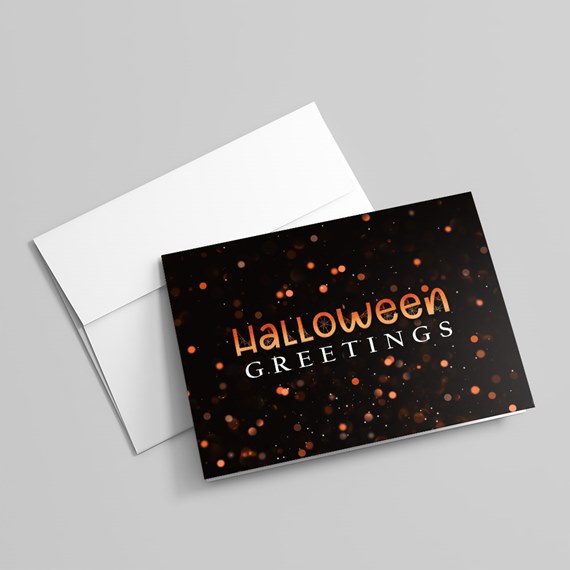 Halloween greeting card with bokeh effects
