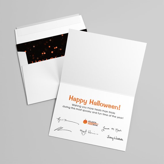 greeting card with happy halloween message and bokeh pattern