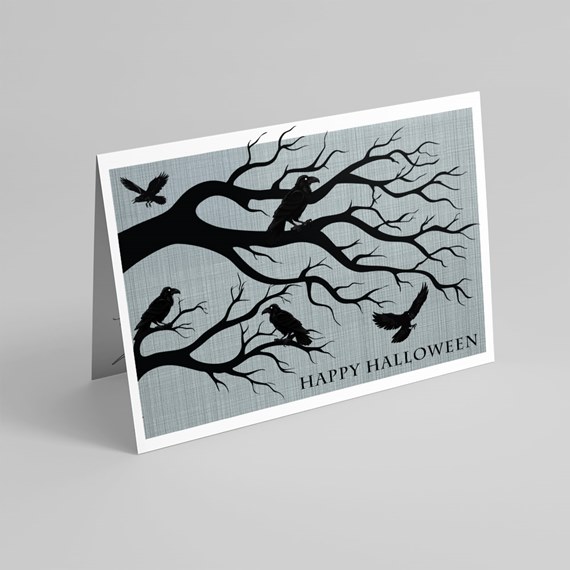 Halloween card with black branches and birds on a gray background