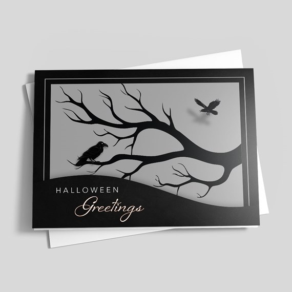 Halloween greeting card with tree and bird silhouettes