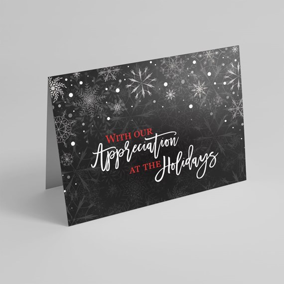 holiday greeting card with snowflakes and text