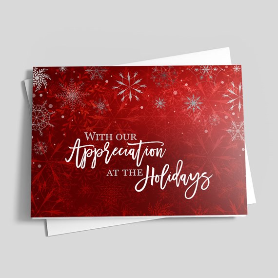 holiday card design with snowflakes and text