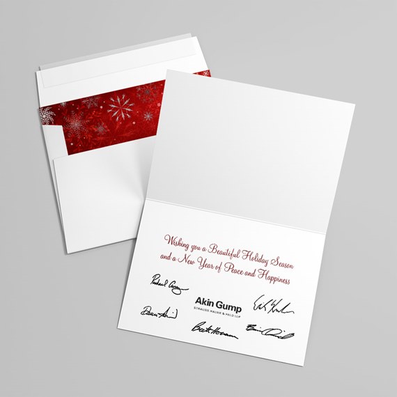 holiday card with snowflake pattern and greeting