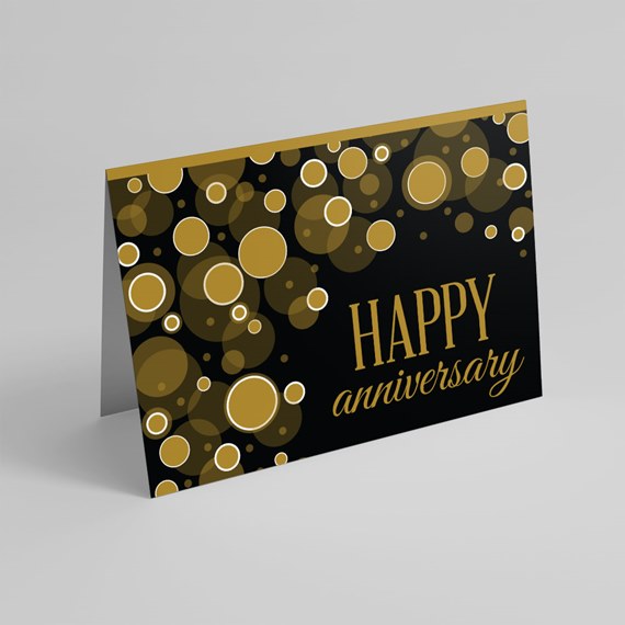 anniversary card with circles and text
