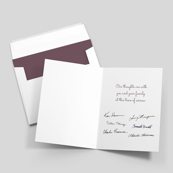 greeting card with signatures and maroon envelope
