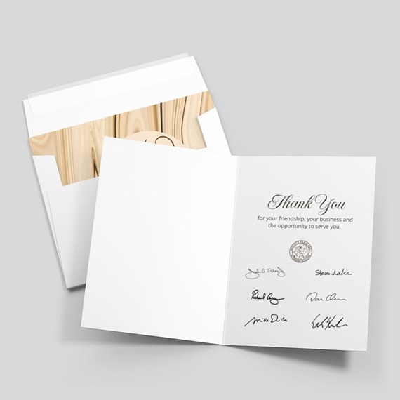 thank you card with wood grain envelope and printed signatures