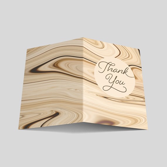greeting card with swirled marble design and text area