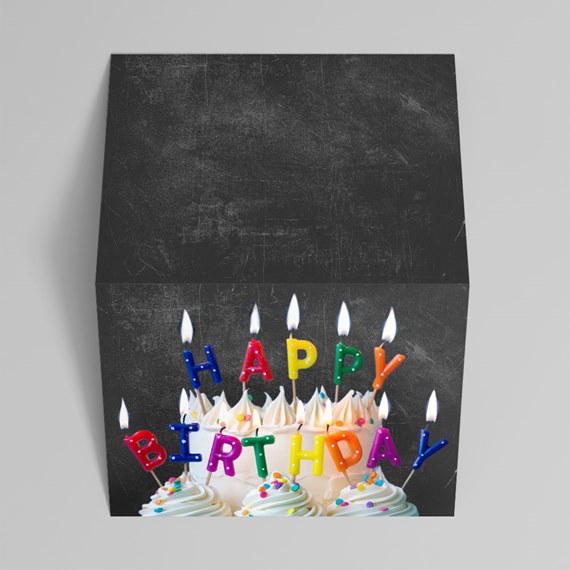 birthday cake with candles and happy birthday text