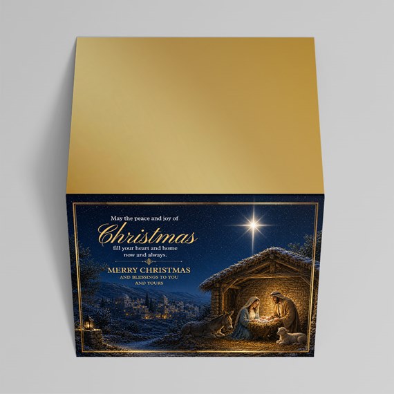 gift box with nativity scene and gold top