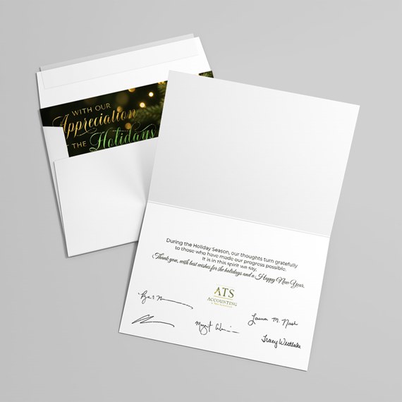 folded card with holiday message and logo placeholder