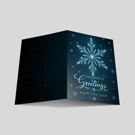 greeting card with snowflake design and text