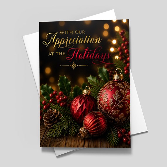 holiday card with ornaments and foliage